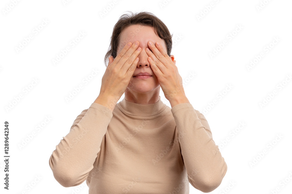 A woman in a beige turtleneck covering her face with her hands against a white background. A woman in a beige turtleneck covering her face with her hands against a white background.
