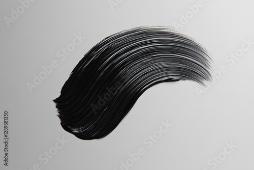 black smooth cosmetic swipe on white background