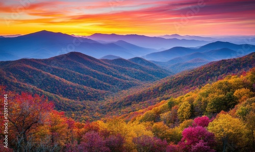 Colorful autumn sunrise over scenic mountain range vista
