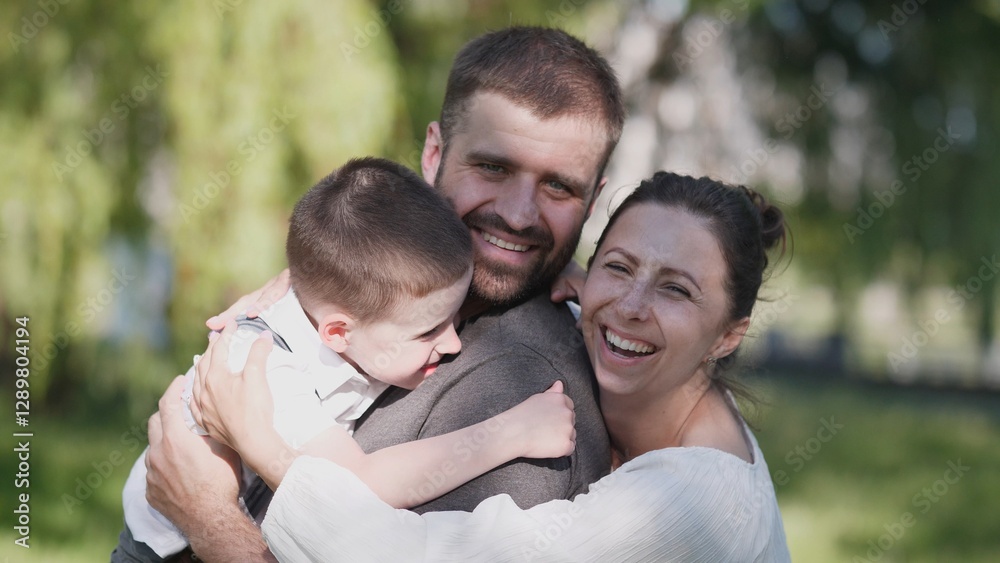 A joyful and happy family happily enjoying a beautiful sunny day outdoors, showcasing love and togetherness A joyful and happy family happily enjoying a beautiful sunny day outdoors, showcasing love and togetherness