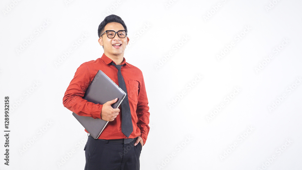 Portrait of Smiling Asian Male Office Worker Business Man Standing Casually While Holding Laptop Computer Isolated on White Background Portrait of Smiling Asian Male Office Worker Business Man Standing Casually While Holding Laptop Computer Isolated on White Background