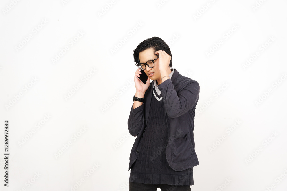 Headache while on phone Of Handsome Asian Man Isolated On White Background Headache while on phone Of Handsome Asian Man Isolated On White Background