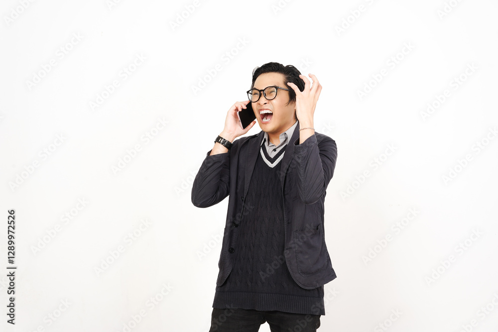 Mad Angry while on phone Of Handsome Asian Man Isolated On White Background Mad Angry while on phone Of Handsome Asian Man Isolated On White Background