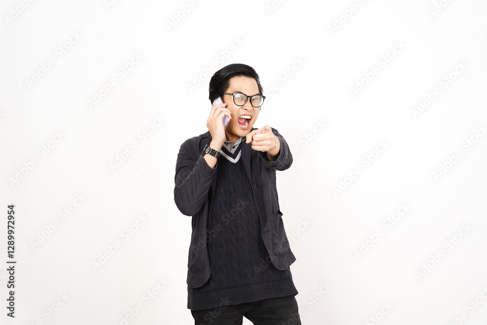Mad Angry while on phone Of Handsome Asian Man Isolated On White Background Mad Angry while on phone Of Handsome Asian Man Isolated On White Background