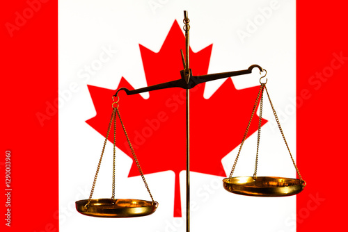 Golden scales on the background of the Canadian flag