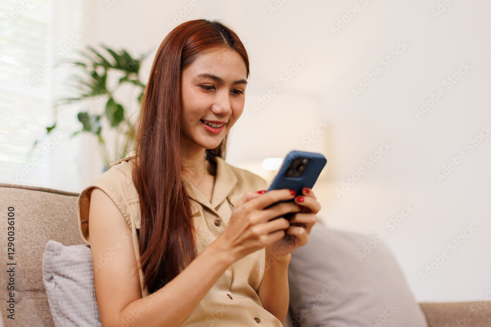 Shot of sad young asian woman overthinking while holding laptop computer and mobile phone sitting on the sofa at home
Shot of sad young asian woman overthinking while holding laptop computer and mobile phone sitting on the sofa at home