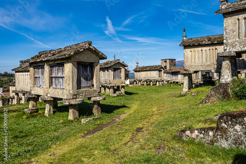 The communitarian granaries, called espigueiros, in the village of Lindoso, Peneda National Park, Northern Portugal photo