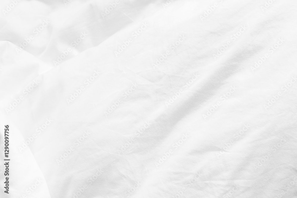 White bed sheet texture background, wrinkled duvet, crumpled satin blanket comforter cloth used in hotel, resort or home interior for bedding and sleep comfort White bed sheet texture background, wrinkled duvet, crumpled satin blanket comforter cloth used in hotel, resort or home interior for bedding and sleep comfort