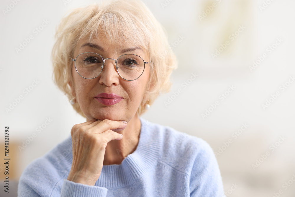 Portrait of grandmother in glasses at home. Space for text Portrait of grandmother in glasses at home. Space for text