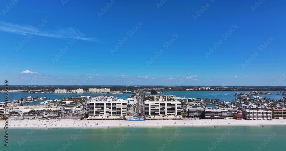 Madeira Beach, FL, USA - 02-23-2025: Winter aerial video of the vacation beach community, Madeira Beach, on the Gulf of Mexico. Madeira Beach, FL, USA - 02-23-2025: Winter aerial video of the vacation beach community, Madeira Beach, on the Gulf of Mexico.