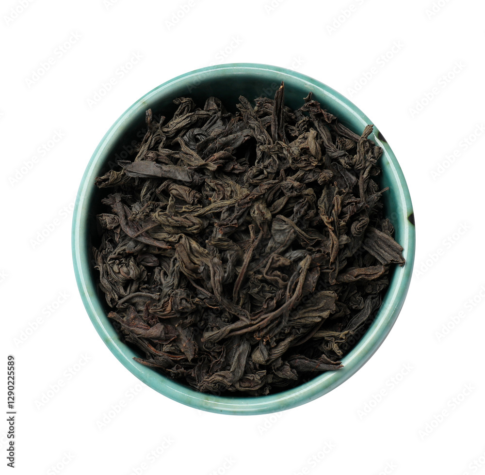 Dry tea leaves in bowl isolated on white, top view Dry tea leaves in bowl isolated on white, top view