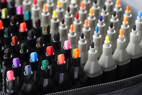 Foto Many colorful markers in bag, closeup. Art supplies