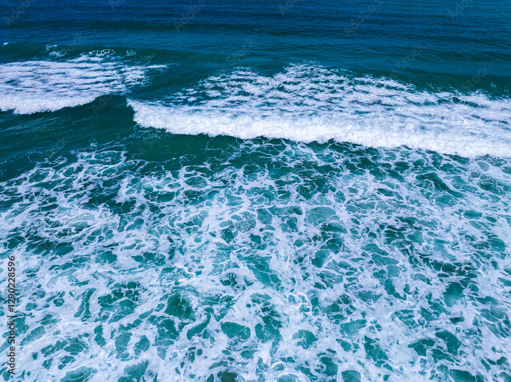 Fototapeta premium Beautiful sea beach background,Sea surface with small waves in the ocean nature background