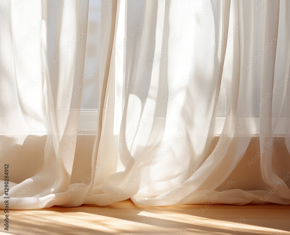 Sheer curtains illuminate a sunlit room. Sheer curtains illuminate a sunlit room.