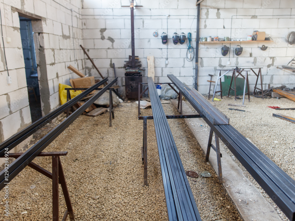 A workshop with a lot of tools and a stove A workshop with a lot of tools and a stove
