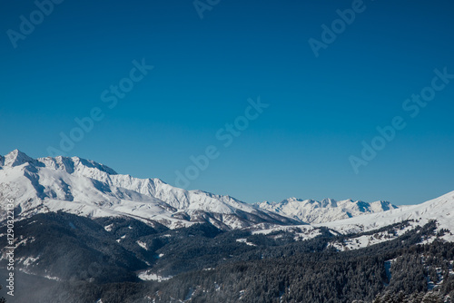 Wallpaper Mural Beautiful landscape, snowy mountain peaks and blue sky Torontodigital.ca