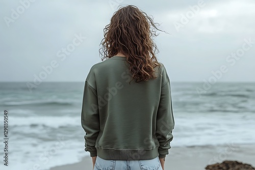 Woman contemplating ocean view