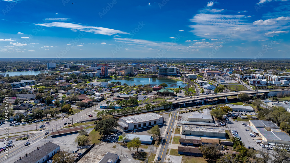 Fototapeta premium Lakeland, FL, USA - 02-23-2025: Winter aerial image of the City of Lakeland, FL, Munn Park Historic District.