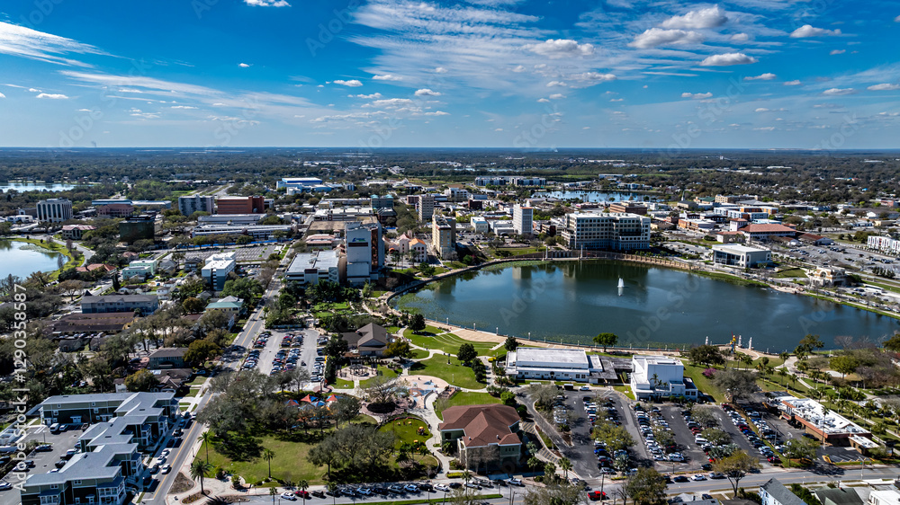Fototapeta premium Lakeland, FL, USA - 02-23-2025: Winter aerial image of the City of Lakeland, FL, Munn Park Historic District.