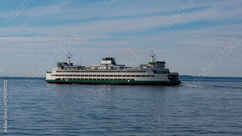 A ferry boat glides across serene waters under a clear blue sky, representing connectivity and the beauty of travel through stunning landscapes.