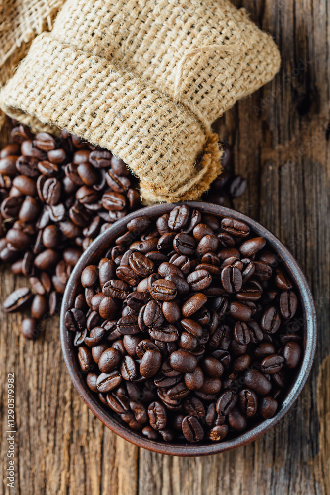 Fototapeta premium coffee beans on wooden background