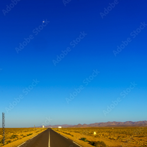 Obraz na płótnie Desert road, with the Atlas Mountains w salonie