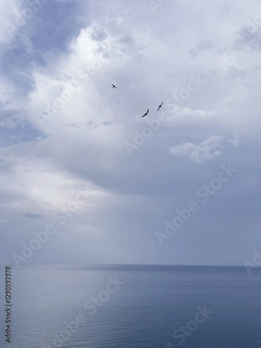 Calm sea and cloudy sky in morning.
