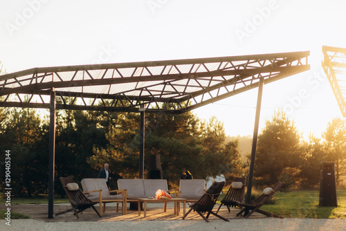 Wallpaper Mural Outdoor Lounge Area Under Modern Canopy During Serene Sunset Setting Torontodigital.ca