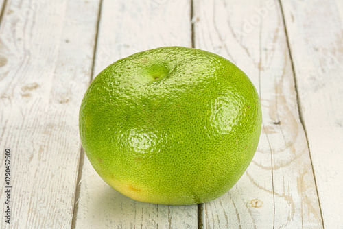 Fotografi Green ripe fruit sweetie citrus