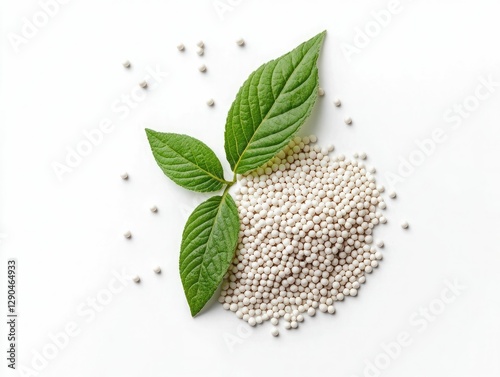 White granular fertilizer with green leaves, organic theme