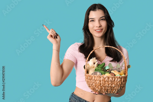 Pretty young woman holding ...