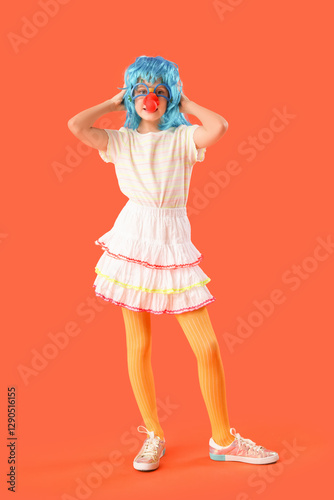 Funny girl with colorful wi...