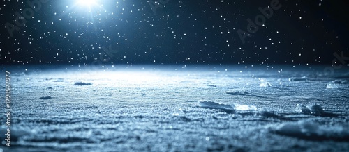 Ice surface with snowflakes softly falling in a dark setting illuminated by a bright spotlight highlighting the textured ice and snow background.