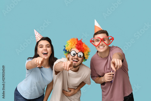 Young friends in funny disg...