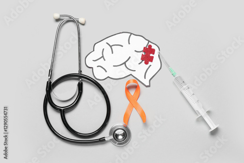 Stethoscope, syringe, paper...