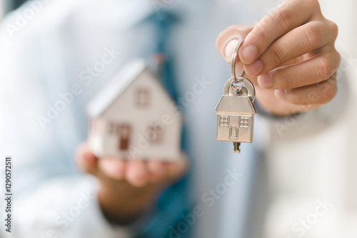 Fototapete Real estate office close-up keys and house model presenting prime investment opp