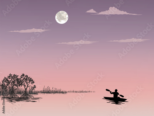 Kayaker sunset on the river