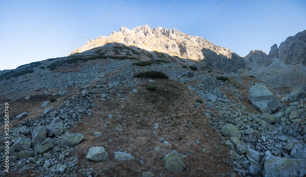 Travel along a marked mountain trail in the High Tatras. Landscape of high mountains.