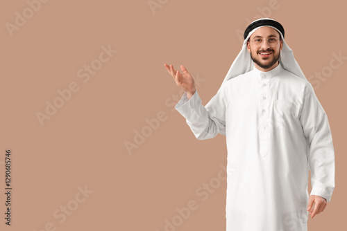 Arab businessman on beige b...