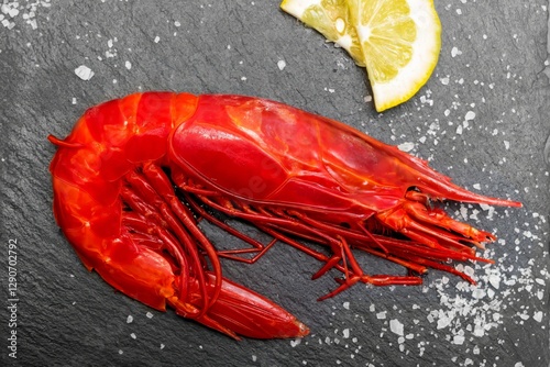 Grilled Carabinero Shrimp with Lemon on a Black Slate