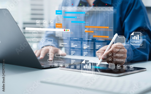 Project management tool concept. Business people use laptop to manager working projects and update task with Gantt chart schedule to Business plan and progress. Planning software. photo