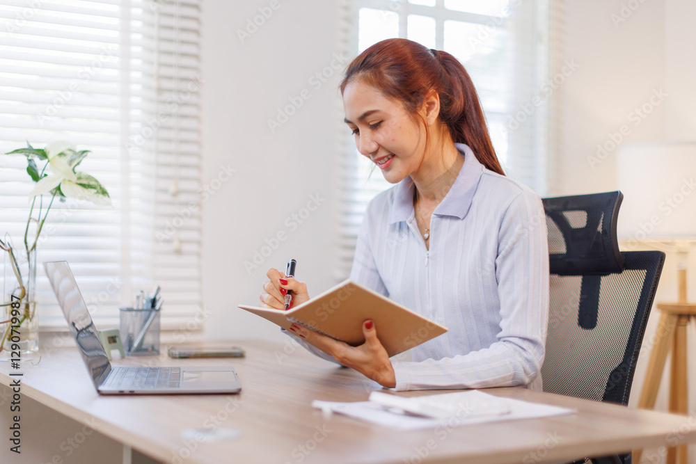 Smiling Young asian woman Using Laptop And Taking Notes While Sitting At Desk At Home, Smiling asian female Enjoying Remote Education And Distance Learning, Free Space
Smiling Young asian woman Using Laptop And Taking Notes While Sitting At Desk At Home, Smiling asian female Enjoying Remote Education And Distance Learning, Free Space
