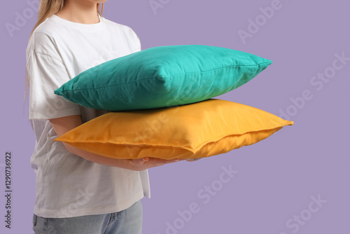 Woman holding stack of two ...