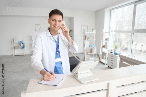 Male medical intern talking...