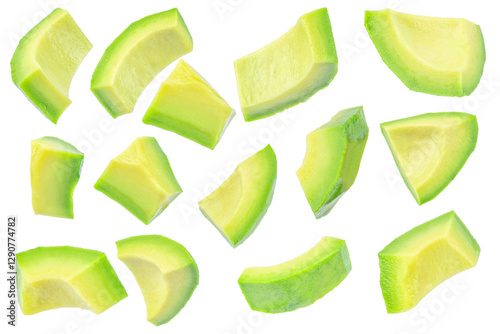 Avocado slices, peeled avocado cubes isolated on white background photo