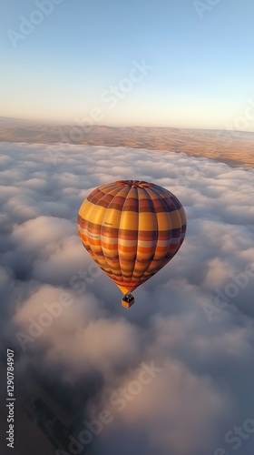 Hot Air Balloon Soaring Above Clouds at Sunrise With Vibrant Colors