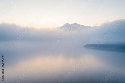 Misty Mountain Overlooking a Tranquil Lake