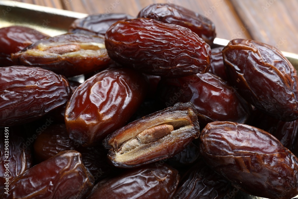 Many tasty dried dates on table, closeup Many tasty dried dates on table, closeup