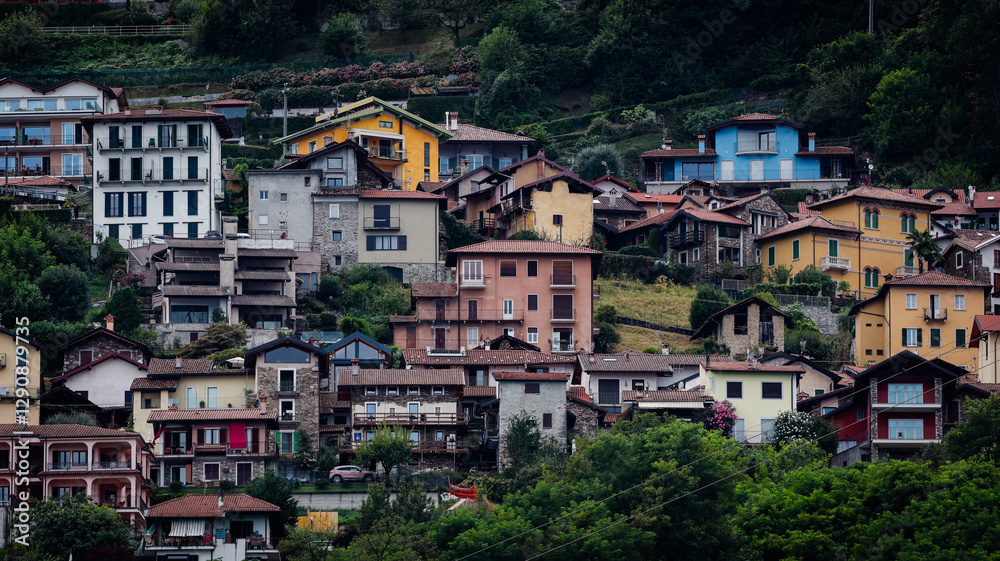 Fototapeta premium Charming hillside houses in Stresa near Lake Maggiore showing colorful architecture