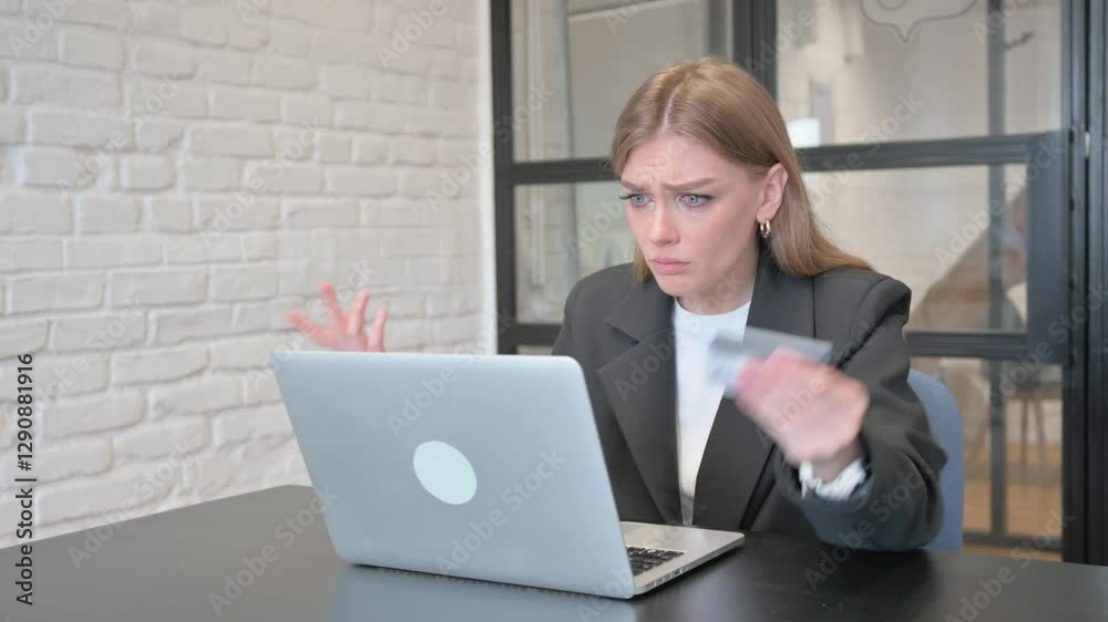 Businesswoman Having Online Banking Problems in Office Businesswoman Having Online Banking Problems in Office